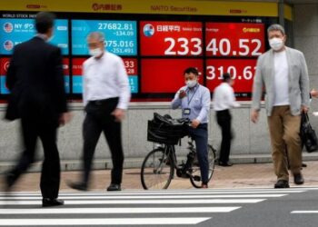 Asian stocks weaken on stimulus worries, dollar holds firm