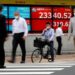 Asian stocks weaken on stimulus worries, dollar holds firm