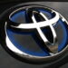 Toyota cuts output target by half a million