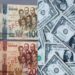 Fitch Solutions forecasts 43% depreciation of cedi to dollar in 2022
