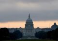 US budget deficit forecast $1 trillion higher over next decade, watchdog says